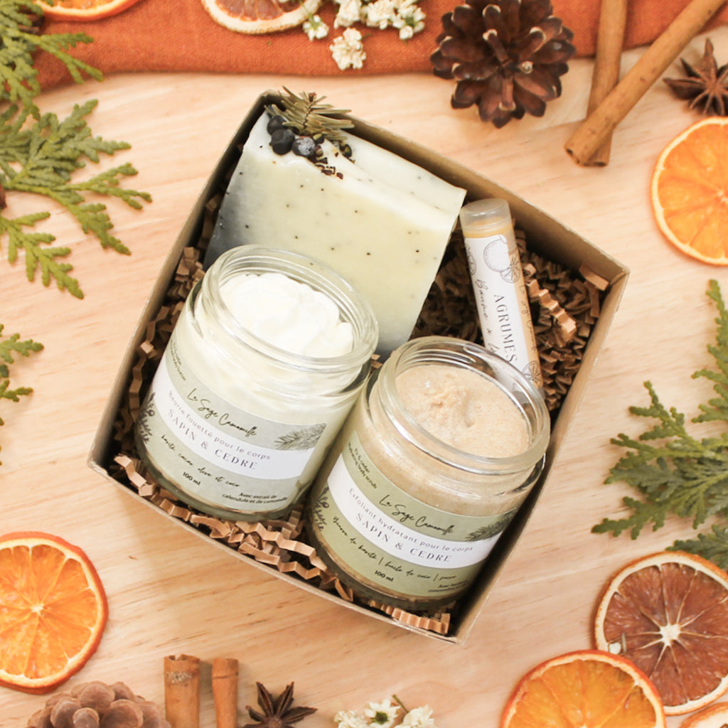 Boîte-cadeau douceur corporelle, contenant un beurre fouetté, un exfoliant, un baume à lèvres et un savon. Faits d'ingrédients naturels et huiles essentielles.
